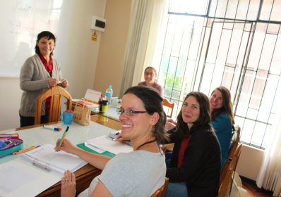 Teacher with multiple students in class